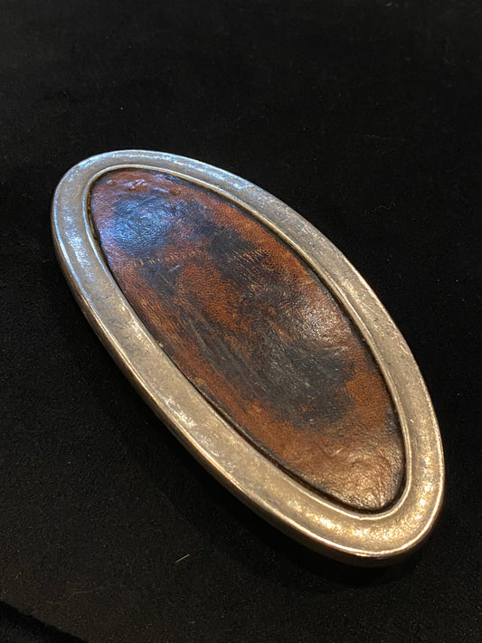 Brown leather and stainless steel oval belt buckle